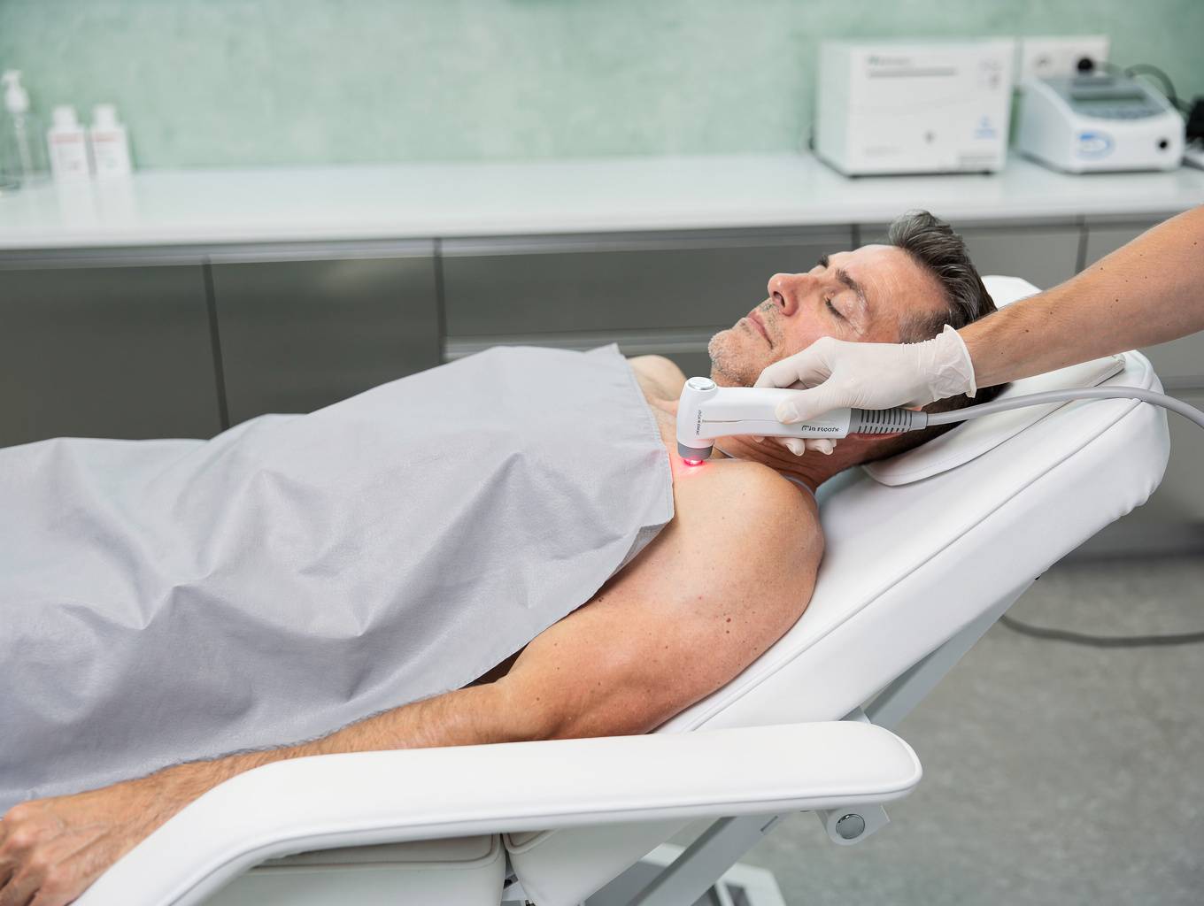 Advanced Class 4 laser therapy equipment being used for patient treatment