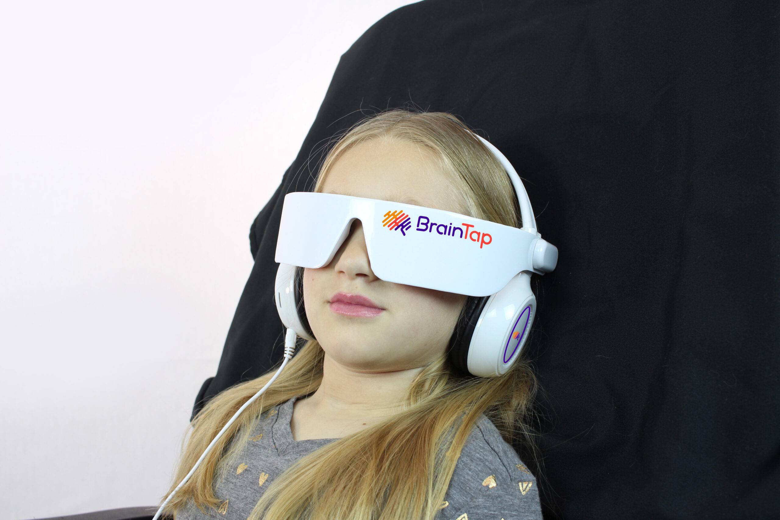 Patient using BrainTap technology for stress regulation